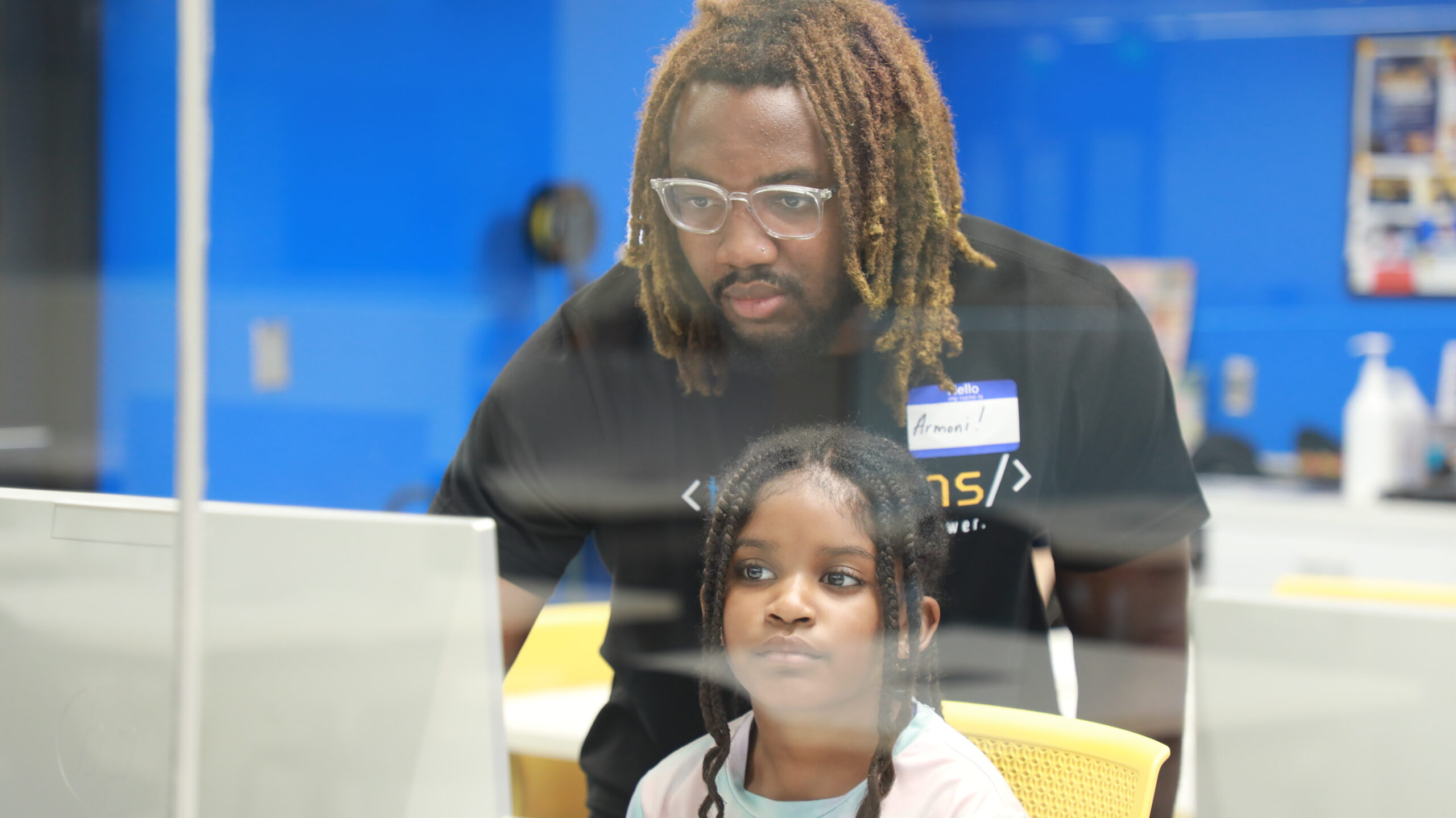 Students engaged in a technology learning experience